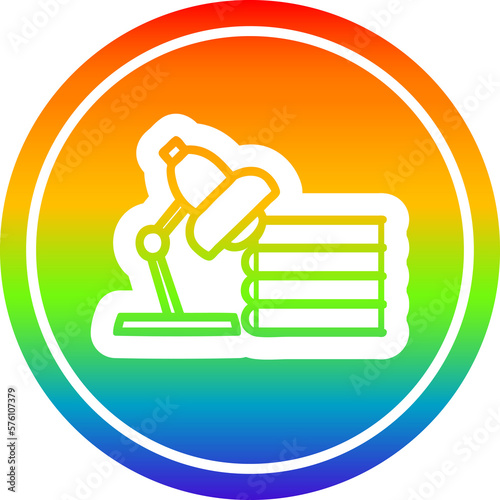 Fototapeta Naklejka Na Ścianę i Meble -  lamp and study books circular in rainbow spectrum