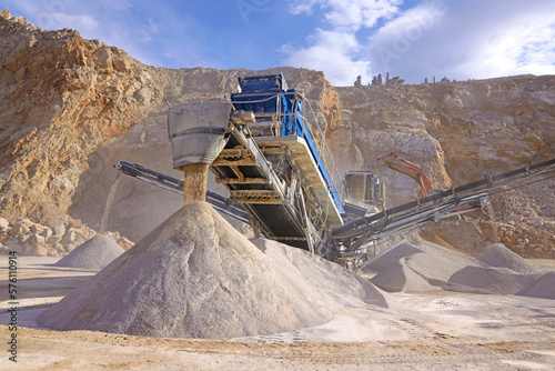 The quarry, stone crushing and production of building materials. Open pit mining and processing plant for crushed stone.