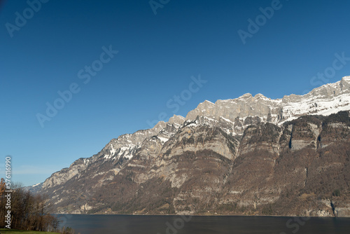 Lake of Walensee and the Alpstein mountains in Unterterzen in Switzerland photo