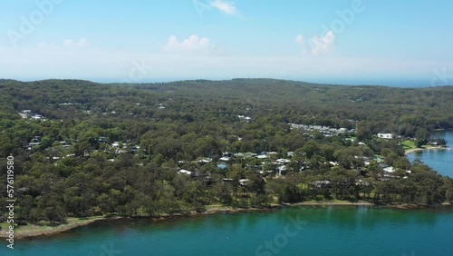 Calm sandy beach on Macquarie lake in Murrays beach resort town as 4k.
 photo