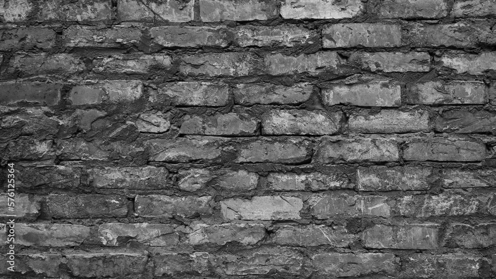Fototapeta premium old gray brick wall close-up