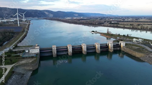 Wallpaper Mural Water dam on the Rhone River and water filtration treatment plants. Overlooking the surrounding mountains in the Ardeche and the wind farm Torontodigital.ca