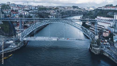 Oporto, Portugal. April 12, 2022: Aerial landscape of the Luis I bridge and the city. photo