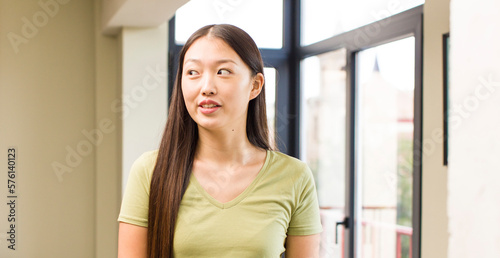 asian pretty woman at home with big windows background Free Download asian pretty woman at home with big windows background - GFXLoad