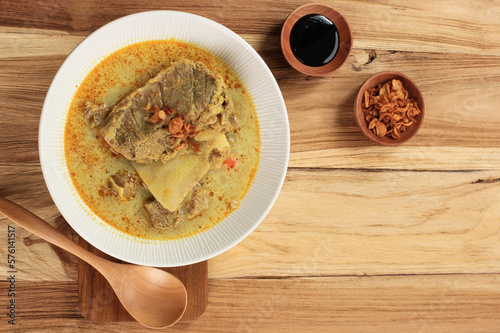 Kari or Gulai Iga Kambing or is Indonesia Traditional Mutton Ribs Curry Soup photo
