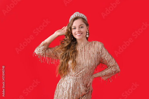 Smiling young woman in sequ...