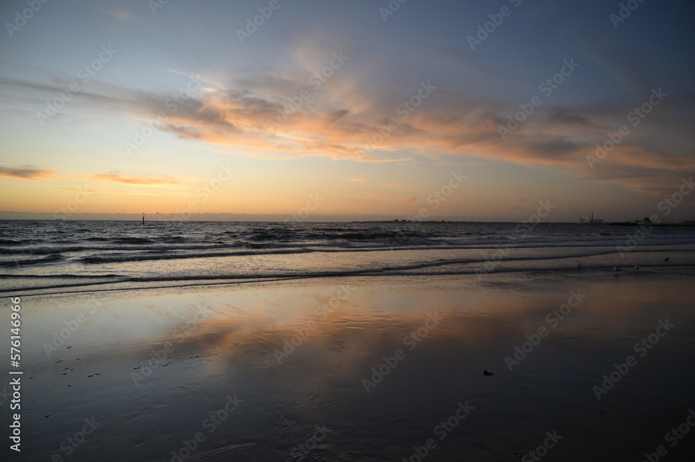 Amazing reflection at the beach near sunset