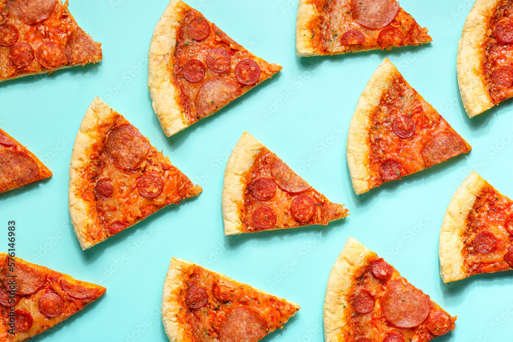 Many slices of delicious pepperoni pizza on turquoise background Many slices of delicious pepperoni pizza on turquoise background