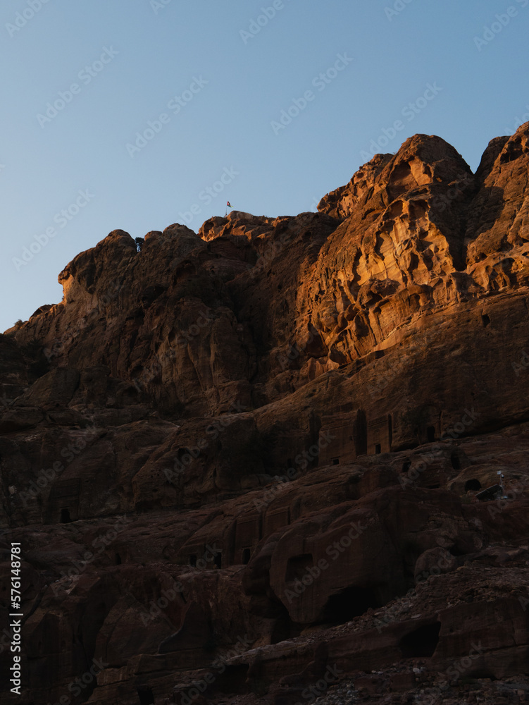  Nabataean caves in petra at sunrise. Jordan