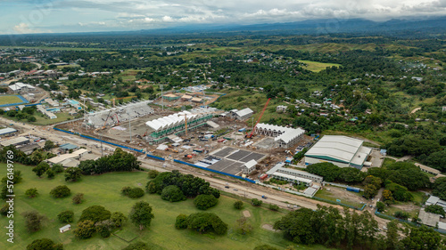 Sports stadiums being built across the road from a popular golf course in Honiara.