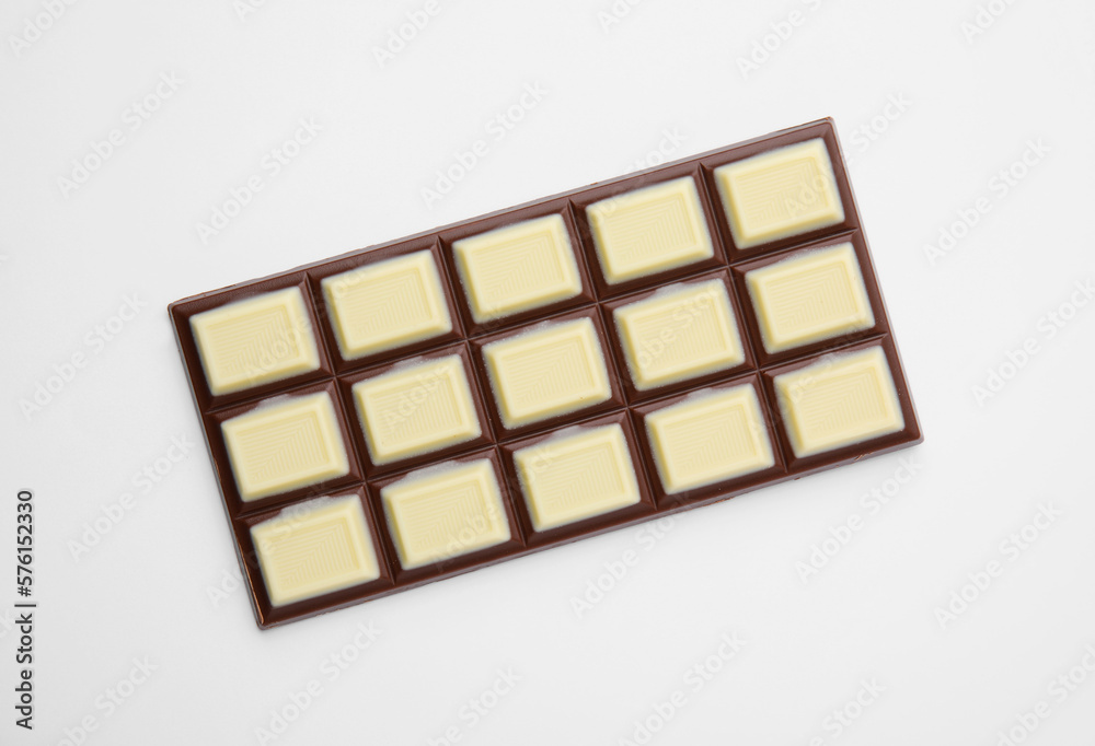 Tasty chocolate bar on white background, top view Tasty chocolate bar on white background, top view