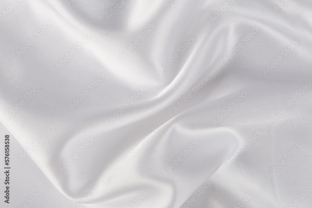 Smooth elegant white silk or satin luxury cloth texture background. 