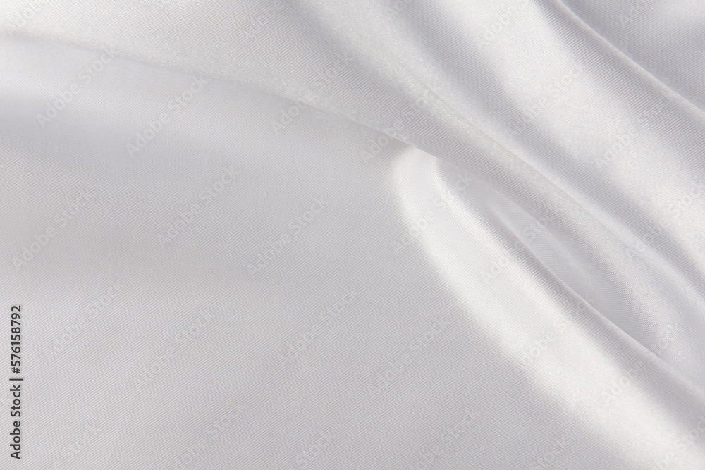 Smooth elegant white silk or satin luxury cloth texture background. Smooth elegant white silk or satin luxury cloth texture background.