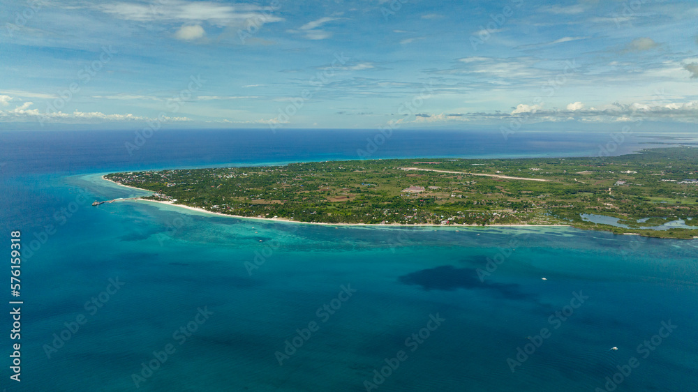 Seascape with tropical island and beach in the sea. Bantayan island, Philippines. Seascape with tropical island and beach in the sea. Bantayan island, Philippines.
