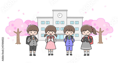 入学式　校舎の前に立つ新一年生4人