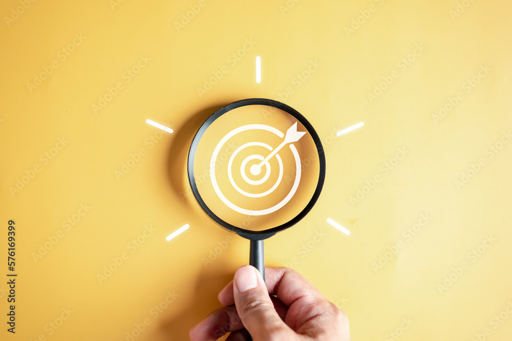 Magnifier glass focus to target objective with idea creative light bulb icon. planning development leadership and customer target group concept... - obrazy, fototapety, plakaty 