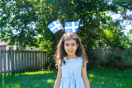 Girl celebrates the national holiday,
Drapeau québec - Happy Quebec Day
Quebec's National Holiday,
La Fete Nationale du Quebec,
St. Jean-Baptiste
