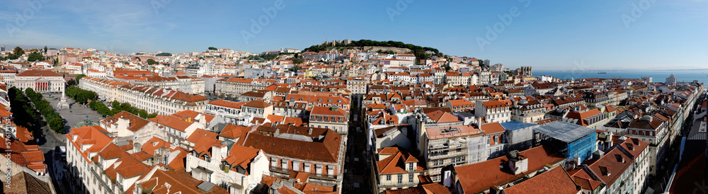 Panoramic aerial view of Lisbon old city with Sao Jorge Castle, Alfama and Rossio Square in Lisbon, Portugal