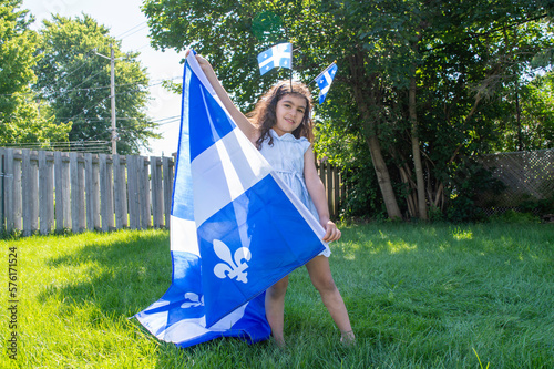 Girl celebrates the national holiday,
Drapeau québec - Happy Quebec Day
Quebec's National Holiday,
La Fete Nationale du Quebec,
St. Jean-Baptiste