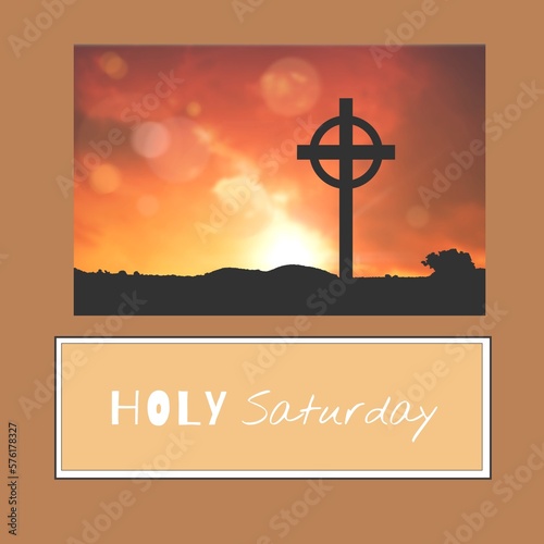Composite of holy saturday text and silhouette cross with circle on land against sky at sunset