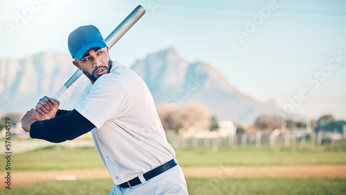 Baseball swing, athlete and mountains of a professional player from Dominican Republic outdoor. Sport field, bat and sports helmet of a man doing exercise, training and workout for a game with mockup photo