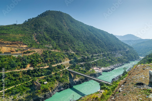 Bridge at Devprayag, Godly Confluence,Garhwal,Uttarakhand, India. Here Alaknanda meets the Bhagirathi river and both rivers thereafter flow on as the Holy Ganges river or Ganga.