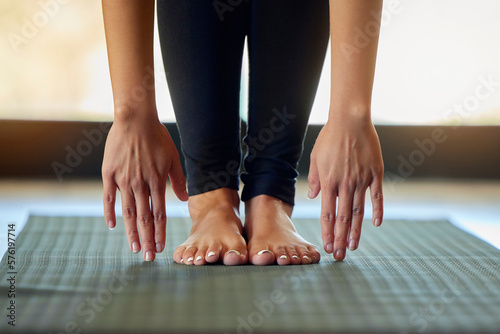 Fotografiet Hands, feet and woman stretching on yoga mat for exercise, cardio and flexibility warm up in her home