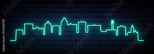 Blue neon skyline of Greensboro. Bright Greensboro, North Carolina City long banner. Vector illustration.