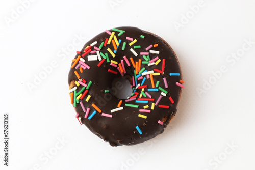 Wallpaper Mural chocolate donut with multi-colored topping on a white background. top view Torontodigital.ca