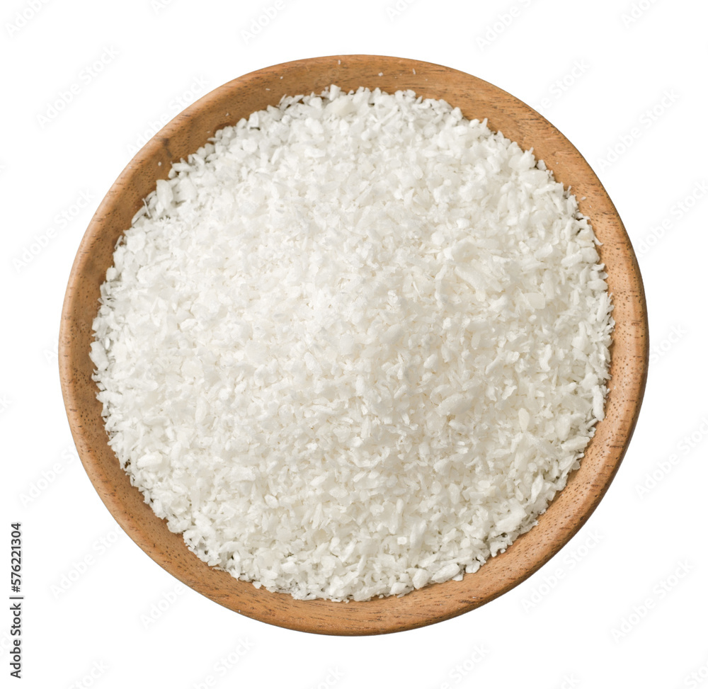 Shredded coconut in the wooden bowl, isolated on the white background, top view. Shredded coconut in the wooden bowl, isolated on the white background, top view.