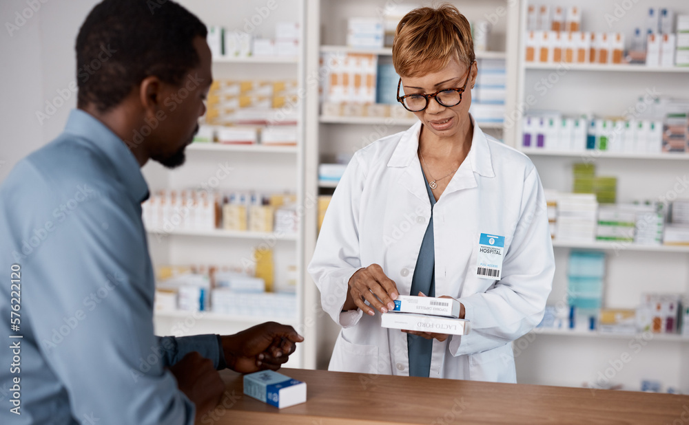 Pharmacist woman, medicine and healthcare with customer while reading information on pills box. Black man with pharmacy, clinic or store worker for pharmaceutical, medical and health counter service