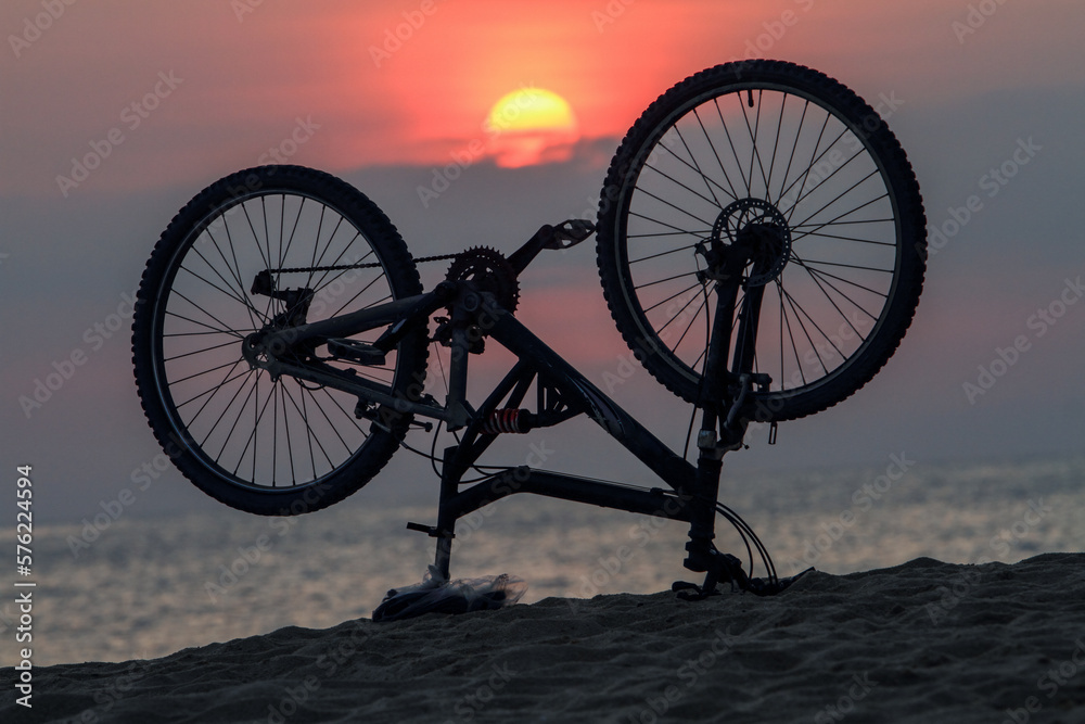 Bike on the beach at sunset, Brazil