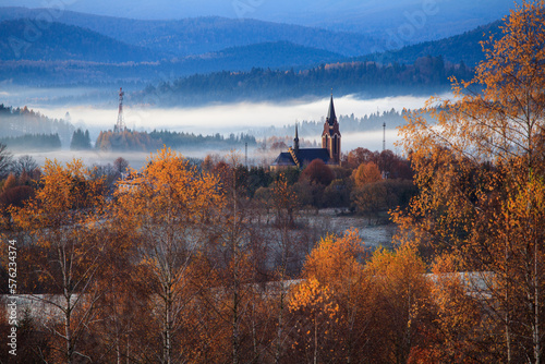 Fototapeta Naklejka Na Ścianę i Meble -  Church in Lutowiska on a foggy autumn morning, Bieszczady Mountains
