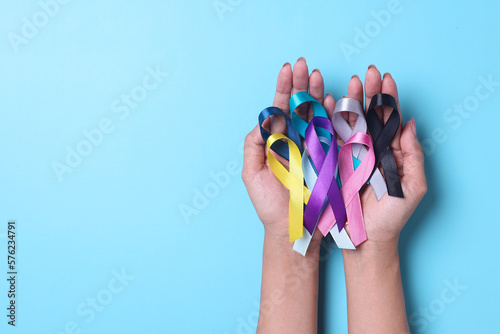 Colorful awareness ribbons for supporting people living and illness. World Cancer Day, healthcare and medical concept.