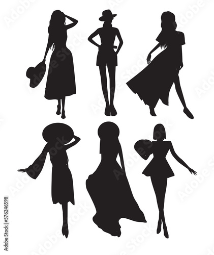 Vector graphics set of different vector black silhouettes of girls in dress for fashion design