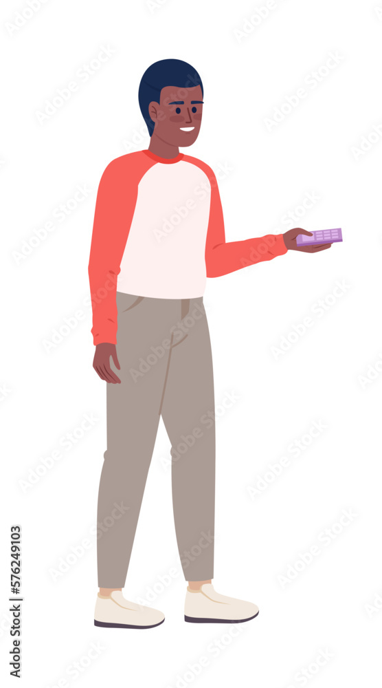 Young man holding remote controller semi flat color vector character. Editable figure. Full body person on white. Simple cartoon style spot illustration for web graphic design and animation