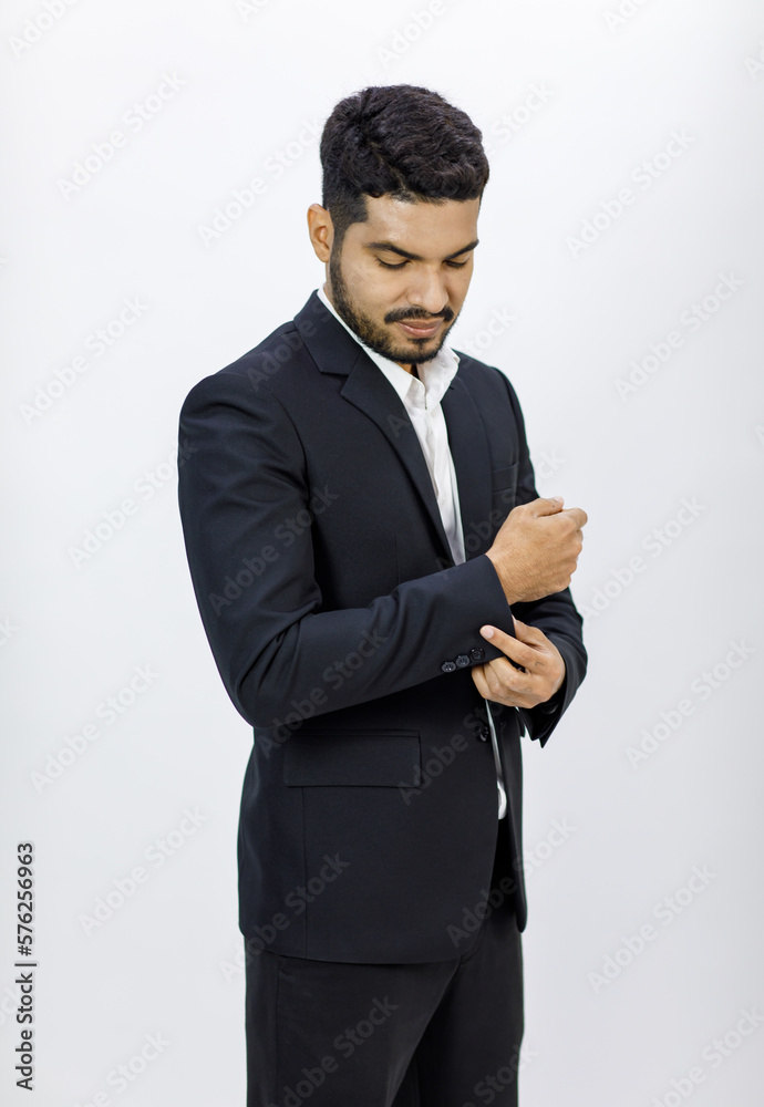 Portrait isolated studio shot Asian Indian professional successful bearded male businessman entrepreneur ceo manager in formal business suit stand smiling posing on white background Portrait isolated studio shot Asian Indian professional successful bearded male businessman entrepreneur ceo manager in formal business suit stand smiling posing on white background