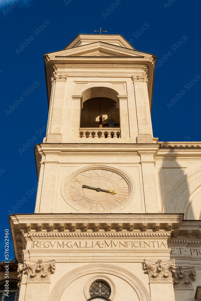 Religious architecture in Rome.Twin bell tower with clock of Trinità dei Monti renaissance church, at the top of famous Spanish Steps