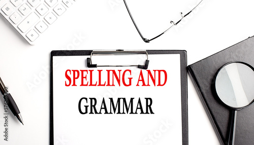 SPELLING AND GRAMMAR text on white paper. the inscription on the notebook photo