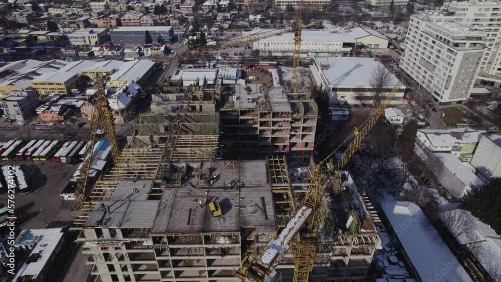 Aerial view of construction site of residential building in the winter Aerial view of construction site of residential building in the winter