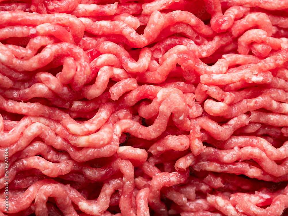 Minced meat on a cutting board. Top view, close-up Minced meat on a cutting board. Top view, close-up