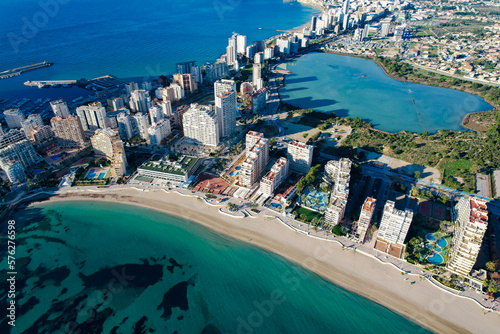 Aerial panoramic view of the beautiful city of Calp in Spain with Peñón de Ifach Parc Natural photo