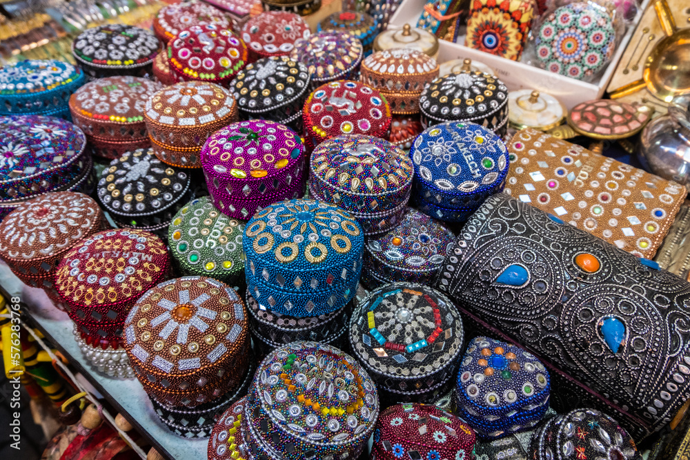 Colorful little boxes covered with stones in a shop in a souk in Marrakech. Colorful little boxes covered with stones in a shop in a souk in Marrakech.