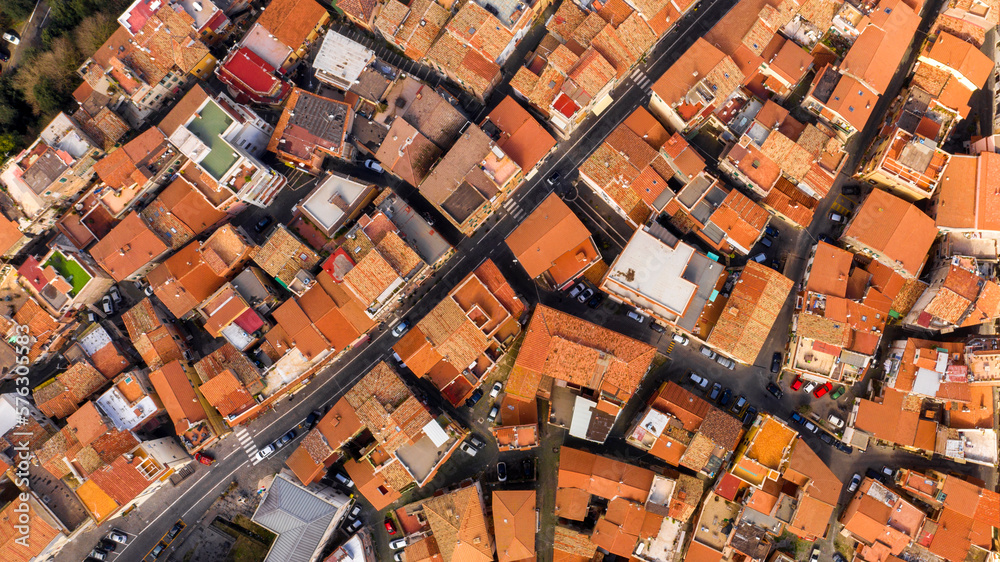 Aerial perpendicular view of the historic center of Ariccia, in the Metropolitan City of Rome, Italy. The small houses of the town are built between the traditional alleys on the hill.
