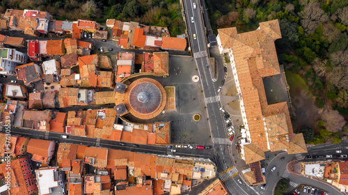 Aerial view of the Republic square and the most important church of Ariccia, a little city of Castelli Romani, in the metropolitan area of Rome. The historical center develops behind the church.