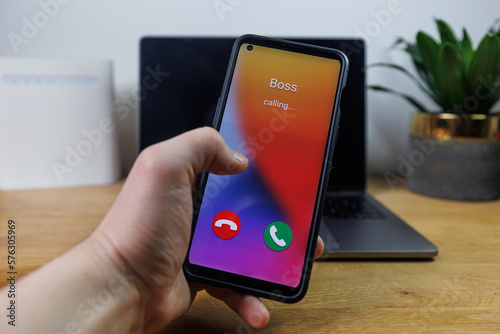 Fotografija Phone call from boss. Incoming call from boss concept