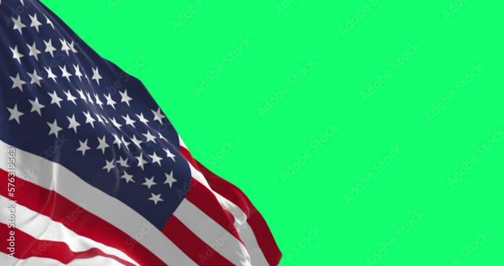 The flag of the United States of America waving isolated on a green background