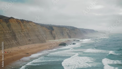 Stormy sea splashing landscape background. Dark ocean waves breaking in beach