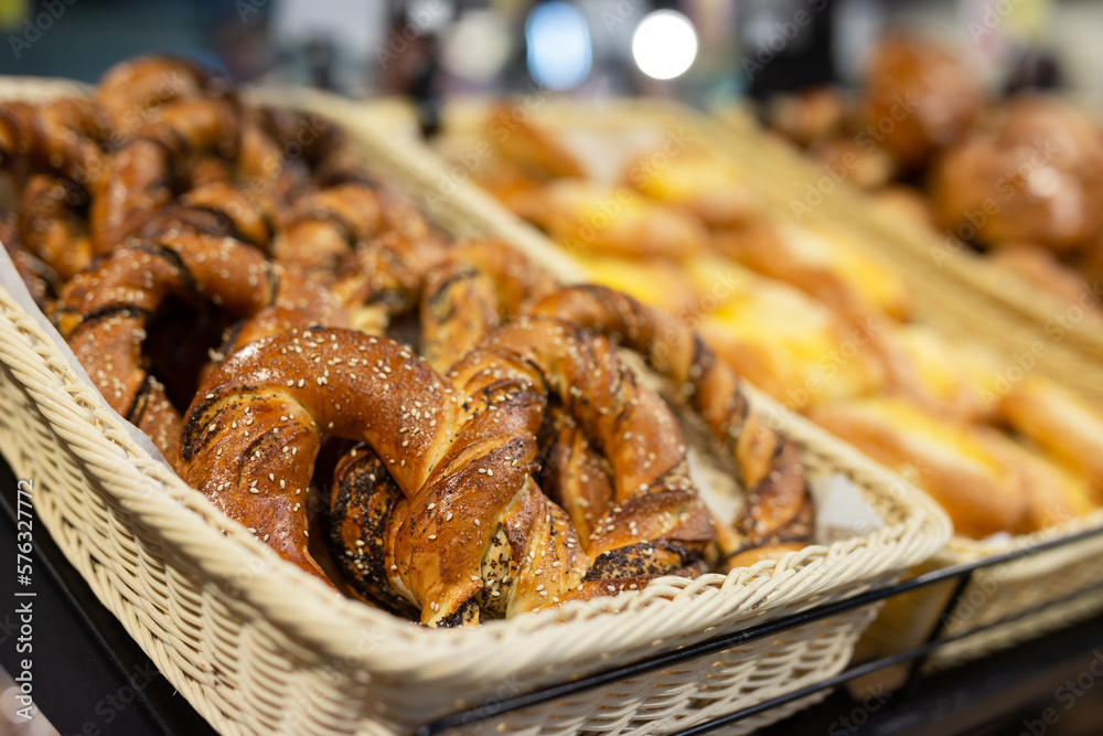 delicious bavarian pretzel in baskets in bakery