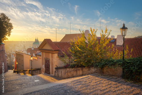 Photography Beautiful view of new castle stairs in the old town with a historic street lamp in the glow of the sunrise